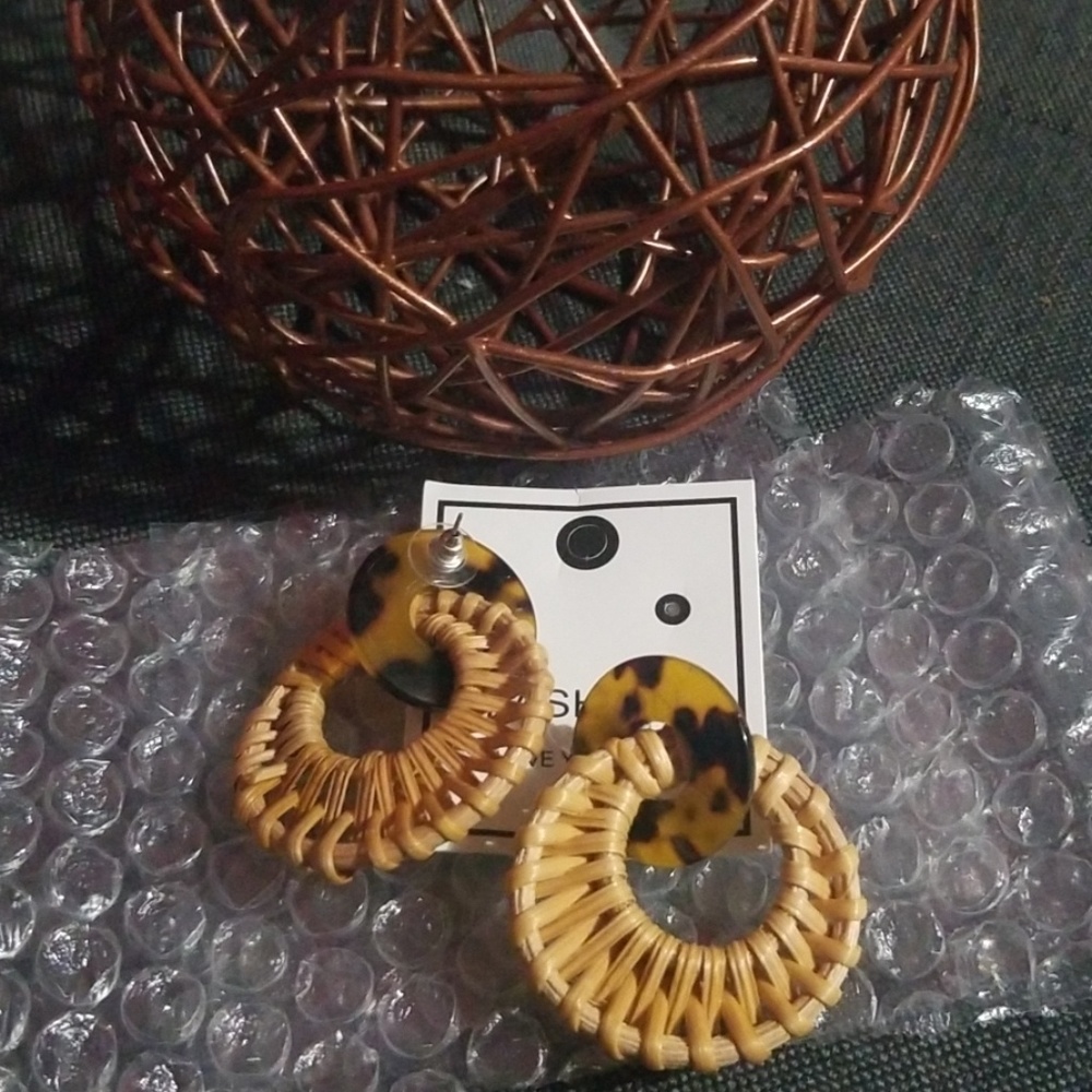 A pair of earrings